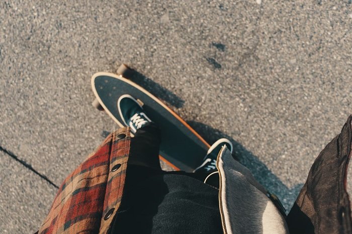 Point of view of man on a skateboard